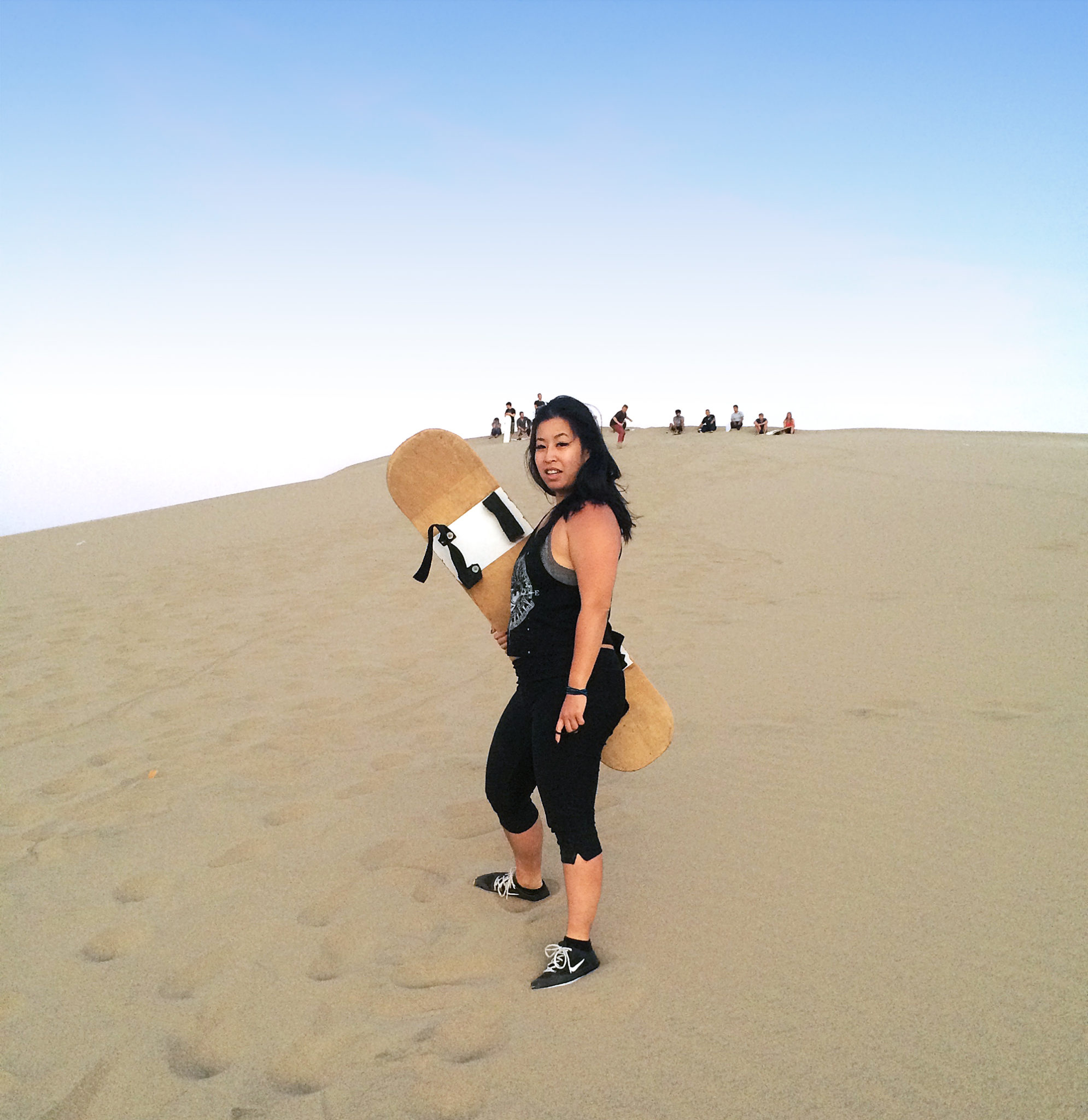 sandboarding in the Peruvian Desert